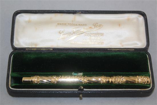 The Swan Pen. An embossed gold plated fountain pen, by Mabie Todd, 5.25in.